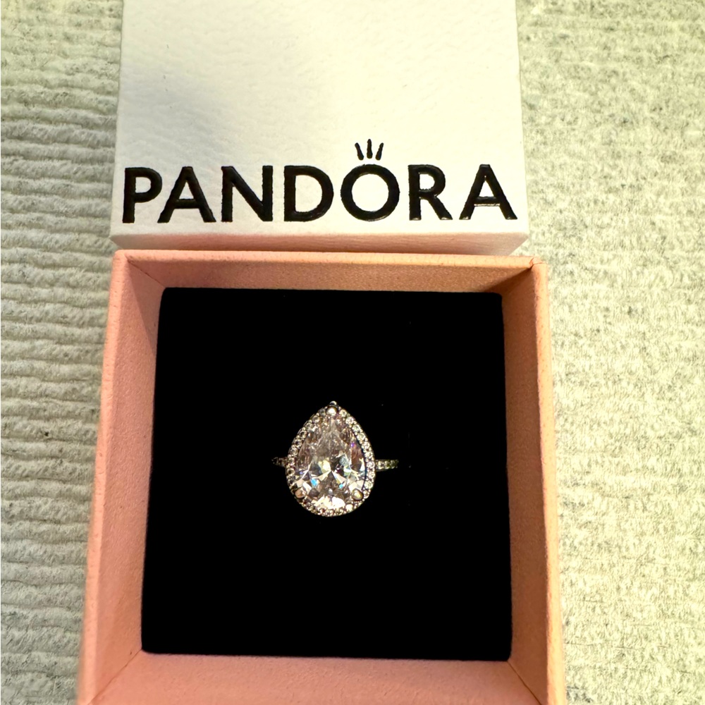 Pandora pear cut ring with halo. Size 4.5.